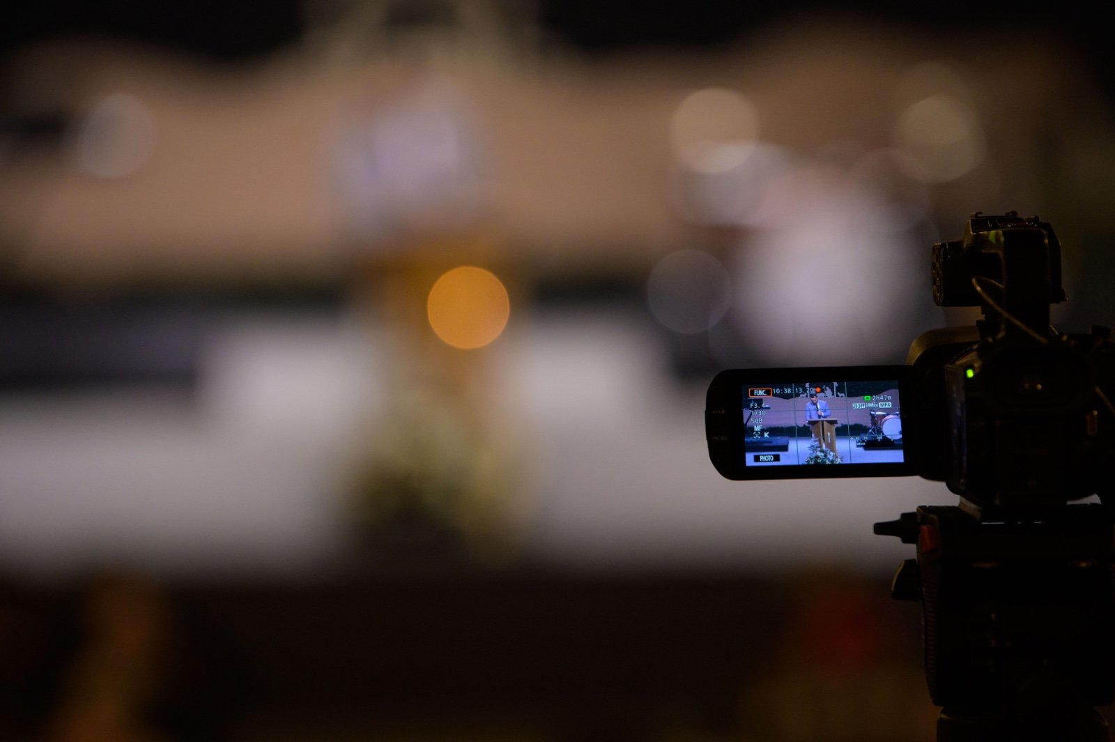 A camera framing the scene in low light